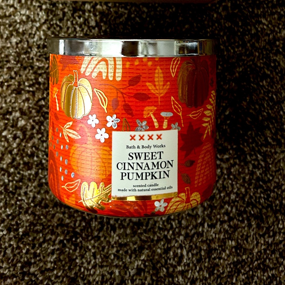 A 3 wick scented candle from Bath and Body Works.